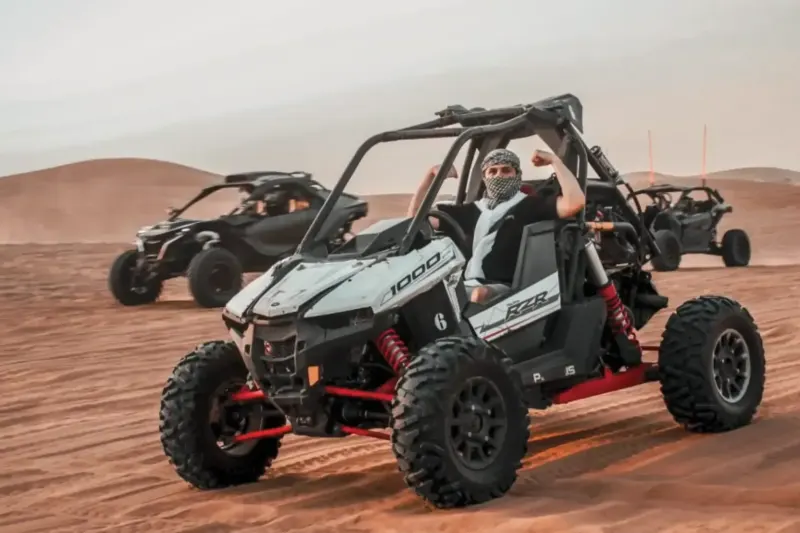 Polaris RZR 1000cc and Can-Am dune buggies from our fleet in the Dubai desert